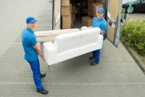 two-happy-male-workers-putting-furniture-boxes-truck_1221914-8969-1.webp