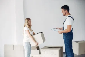 woman-moving-using-boxes_1157-35365.webp
